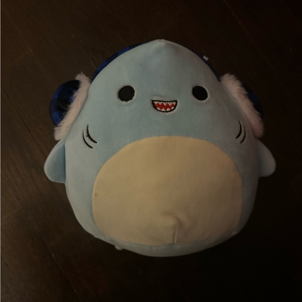 Winter shark squishmallow with ear muffs